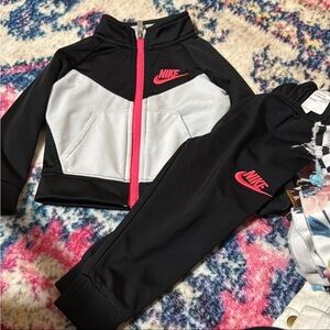 Nike Black and White Tracksuit with Red Accents